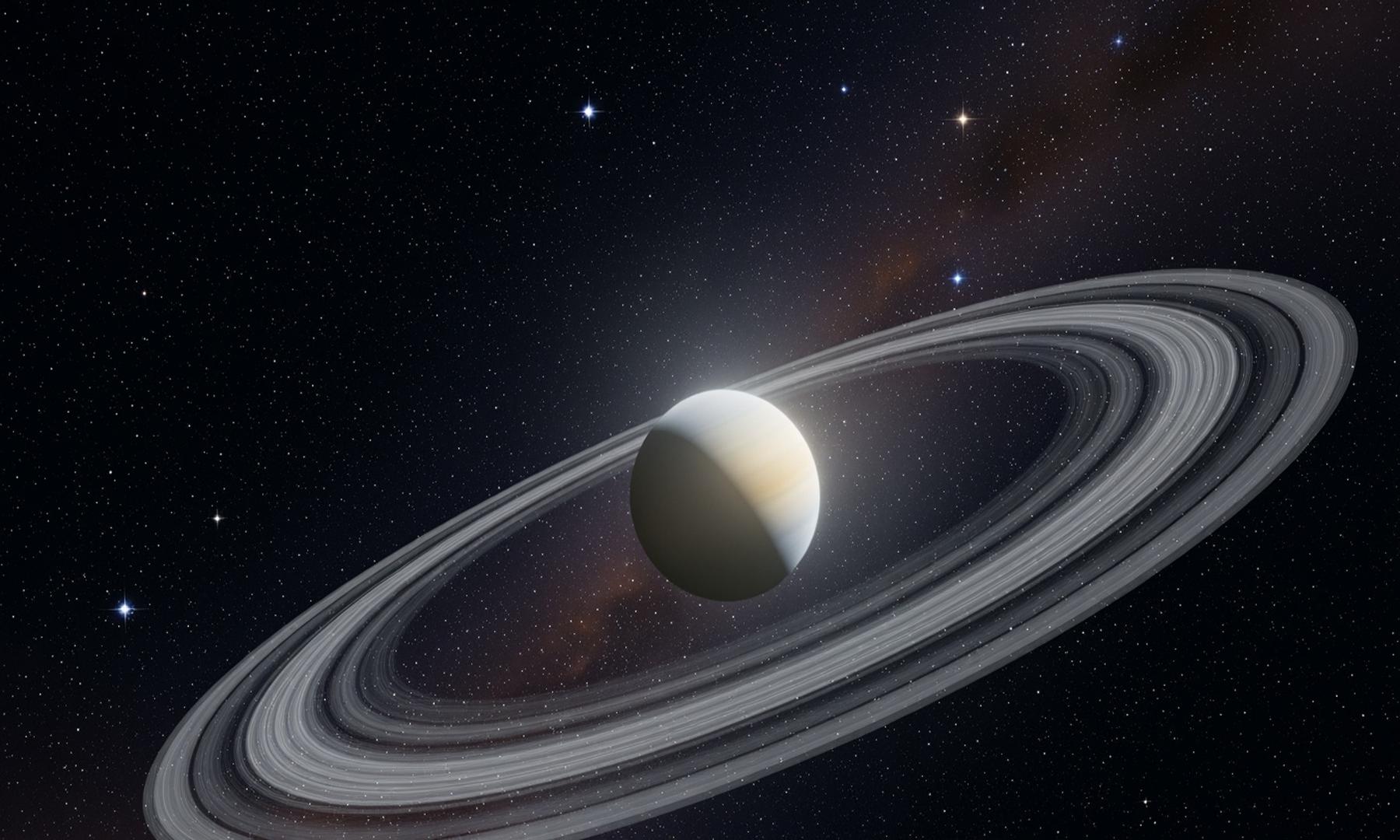 Astronomers Discover Evolving Ring System Around Object Between Saturn and Uranus